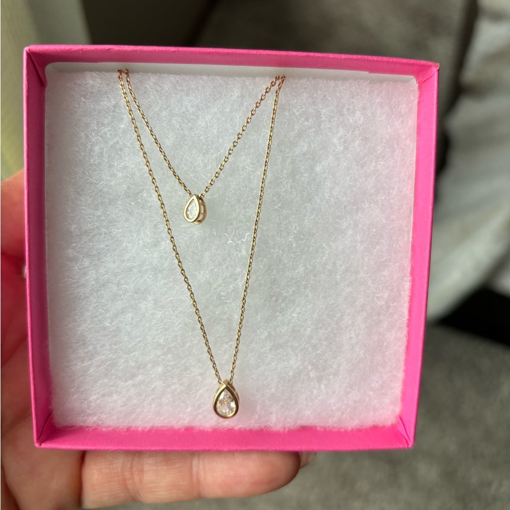 Tiered gold and cubic zirconia necklace